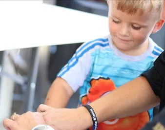 Child getting fingerprinted